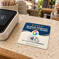 Navy Tap Star card on a speckled stone counter next to the payment terminal