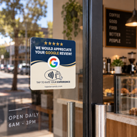 Navy Tap Star card on the glass door of a cafe, with the street beyond